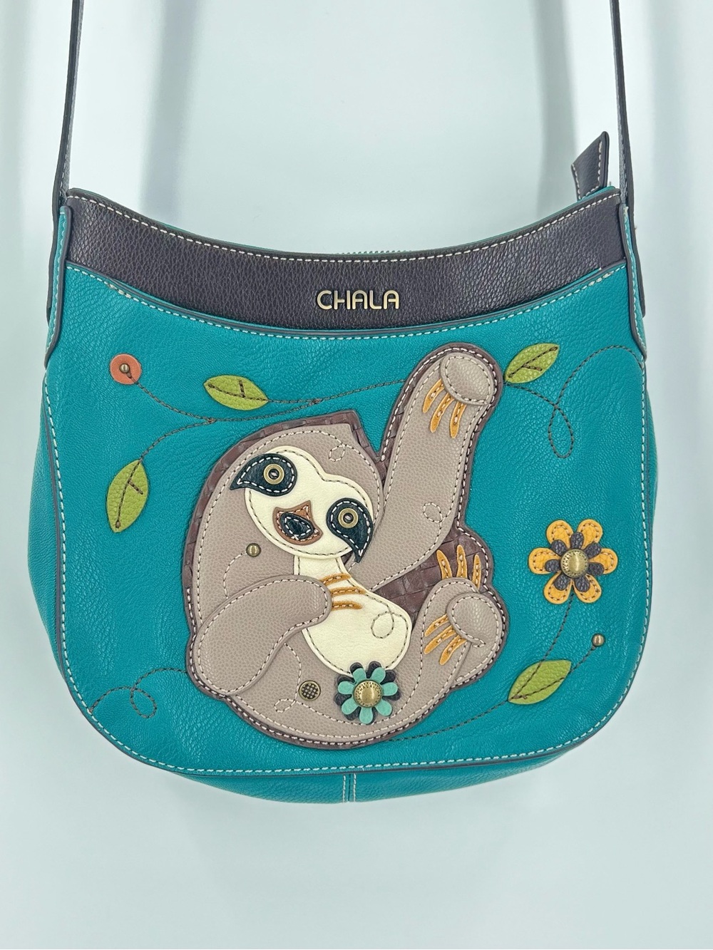 Chala Turquoise Vegan Leather Sloth Crescent Crossbody Bag